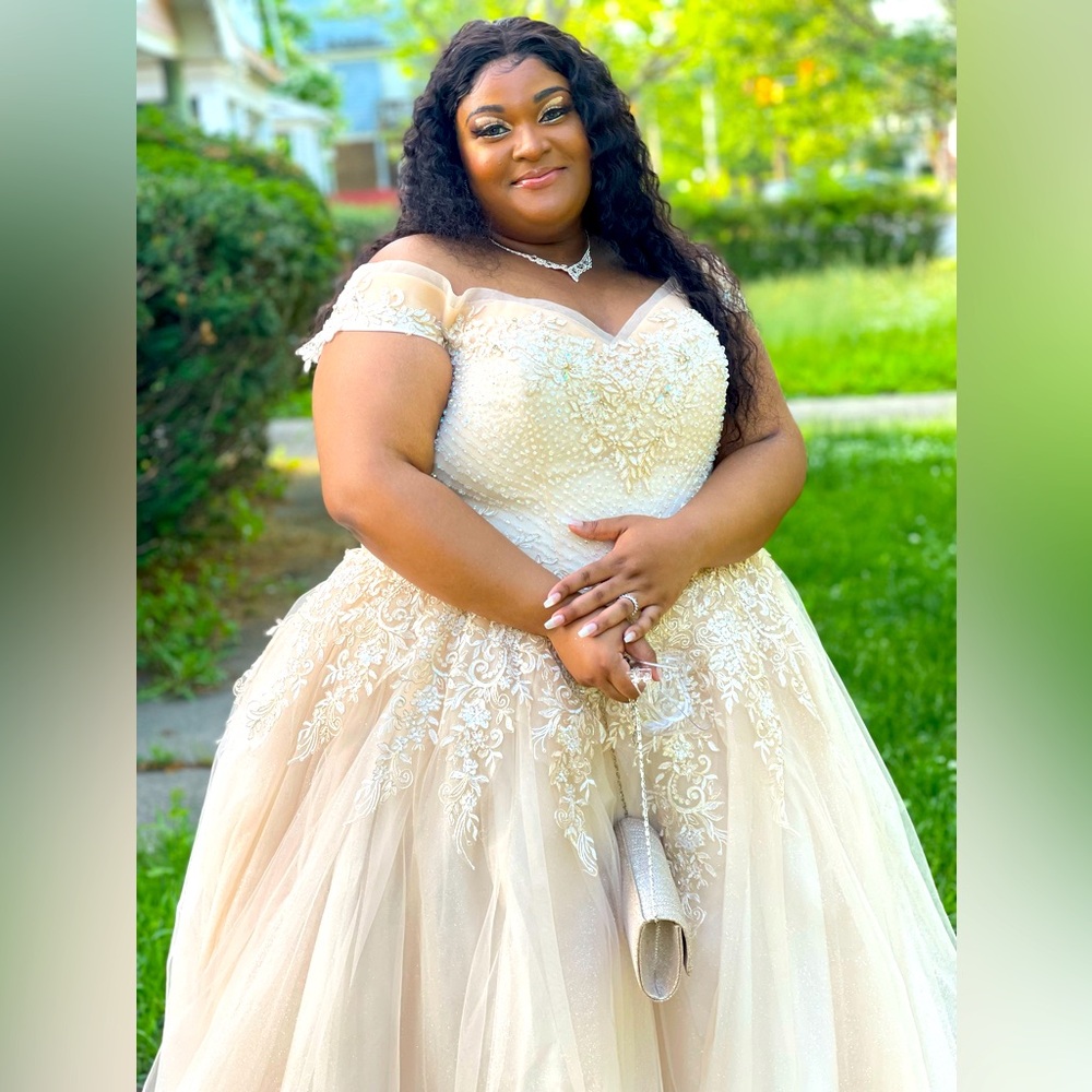 This dress is very elegant and beautiful and I think you would love it!
